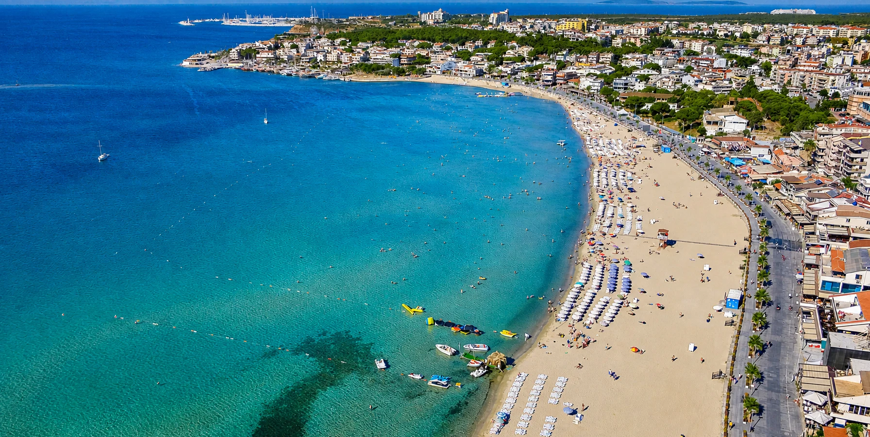 Altinkum sandy beach and turquoise Aegean Sea in Didim Turkey