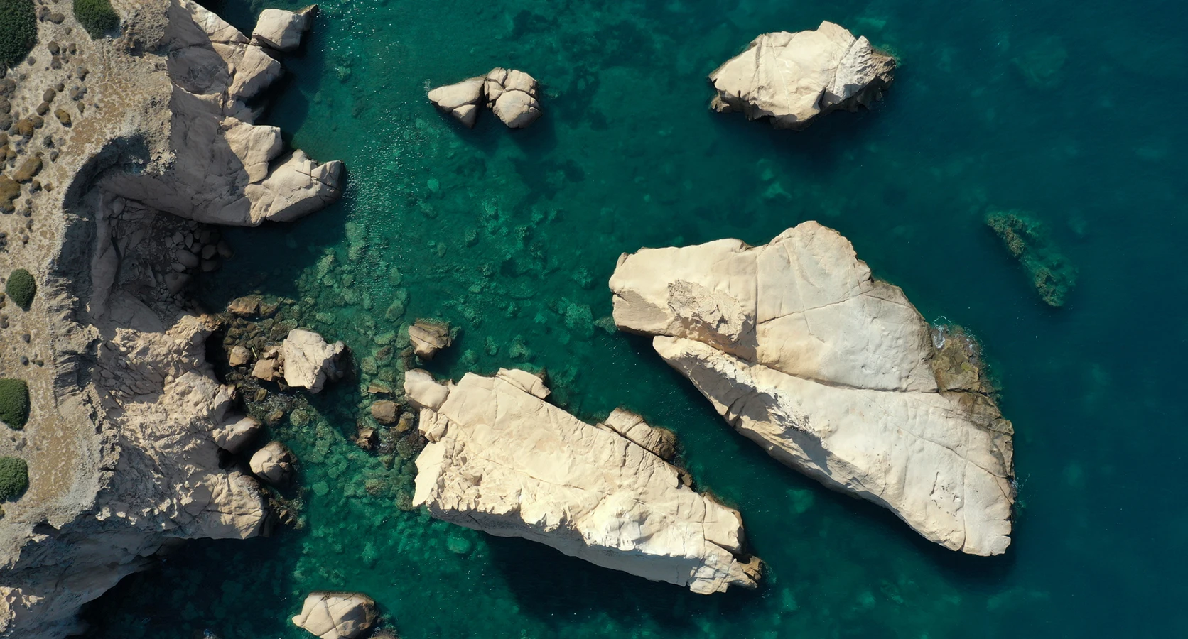 Siren Rocks Foca Orak Island mythology volcanic cliffs Aegean Sea Izmir Turkey
